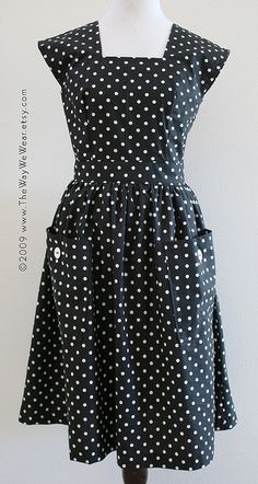 a black and white polka dot dress on a mannequin