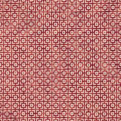 a red and white rug with squares on it