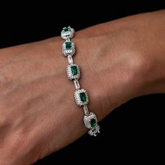 Introducing the Iced Emerald Cushion Cut Bracelet, crafted with precision and style. This eye-catching 14k White Gold piece features pave baguette stations with emerald hand-set stones, adding the ultimate shine to any fit. Pair it with the Emerald Cushion Cut Earrings for a look that is unmatched! This product is guaranteed for life – GLD will repair or replace the item should you experience any defects in craftsmanship or breakage. Specifications - Width: 7mm - Length: 6", 7", 8", & 9" - Weigh Green Emerald Bracelet, Cushion Cut Earrings, Cuban Link Bracelet, Bracelet Christmas, Emerald Bracelet, Cut Earrings, Vermeil Jewelry, Custom Earrings, Hip Hop Jewelry