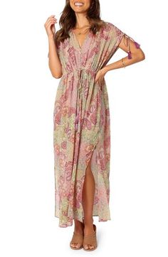 Beautifully patterned fabric is perfectly draped and cinched at the waist of this versatile maxi dress finished with knee-high slits for easy movement. Front button-and-loop closure V-neck Cap sleeves Tie belt 100% polyester Hand wash, dry flat Imported Flowy Maxi Dress With Side Slits, Bohemian Floor-length Dress With Side Slits, Summer Maxi Dress With Tie Waist, Flowy Maxi Dress With Side Slits For Vacation, Bohemian Floor-length Maxi Dress With Side Slits, Bohemian Tie Waist Maxi Dress As Beach Cover-up, Vacation Maxi Dress With Tie Waist, Bohemian Tie Waist Maxi Dress For Beach Cover-up, Vacation Tie-waist Maxi Dress