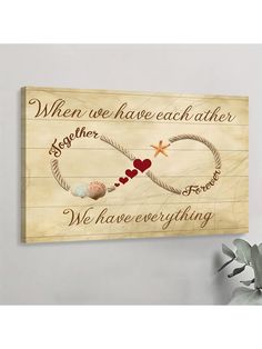 a wooden sign that says when we have each other together, we have everything on it