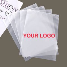 four bags with the words your logo printed on them