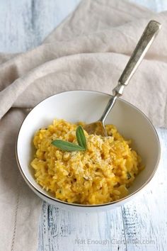 a white bowl filled with macaroni and cheese