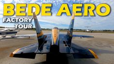 an airplane sitting on top of an airport tarmac with the words bede aero factory tour