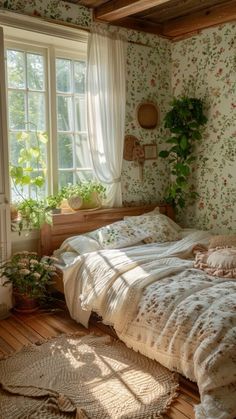 an unmade bed in a bedroom with floral wallpaper and plants on the walls