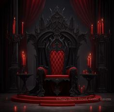 a red chair sitting on top of a stage with candles in the dark behind it