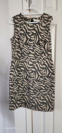 "Beautiful Calvin Klein sheath dress. Green/Beige animal print, polyester brocade fabric. Black polyester liner. Flat measure 17-1/2\" arm pit to arm pit. 16\" waist.  Fits C cup nicely. Nylon zipper." Calvin Klein Sleevless Animal Print, C Cup, Fabric Black, Green Beige, Brocade Fabric, Dress Clothes For Women, Sheath Dress, Calvin Klein, Animal Print