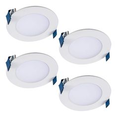 three white downlights with blue trims on each side and one light in the middle