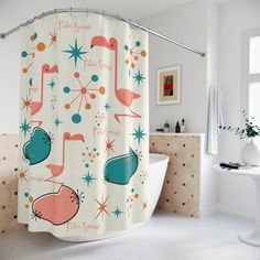 a shower curtain with flamingos and stars on it in a white bathroom next to a bathtub