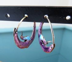 A gorgeous pair of cloisonne arched crane earrings in vermeil (gold wash), with purple and turquoise blue enamel. Probably early Laurel Burch earrings - if you know how to verify (or not), I'd love a convo! In good to very good condition - just gently used and loved - a few small deformities here and there but no loss of enamel or function. For items shipped to places outside of the US, buyers pay all costs related to the import of the items, including customs fees and taxes. Enamel Ear Wire Jewelry, Nickel-free Enamel Hoop Jewelry, Nickel-free Purple Enamel Jewelry, Nickel Free Enamel Hoop Jewelry, Silver Enamel Hoop Jewelry, Silver Hoop Enamel Jewelry, Dark Blue Earrings, Cloisonne Earrings, Laurel Burch