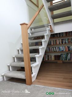 a magazine cover with stairs and bookshelves