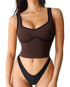 PRICES MAY VARY. Seamed Underbust Padded Crop Tops: Wireless push up workout tops, Medium impact supportive sports bra with built in bra Sweetheart Neckline Sports Bra: Slimming fitted workout gym tops, Thick wide strap compression tank tops, Athleisure loungewear cami tops Longline Basic Yoga Tops: 75% Nylon + 25% Spandex, Thick material no see-through, 4 way stretchy, Breathable sweat wicking, Buttery soft ultra flattering Occasions: This Seamed Underbust Crop Top is perfect for gym, yoga, wor Supportive Sports Bra, Compression Tank Top, Push Up Workout, Basic Workout, Supportive Sports Bras, Basic Yoga, Lounge Lingerie, Gym Tops, Padded Sports Bra