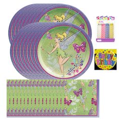 a set of four plates with tinkerbells on them and markers in the background