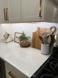 the kitchen counter is clean and ready to be used as a cook's station