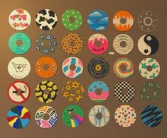 there are many different colored donuts on the wall