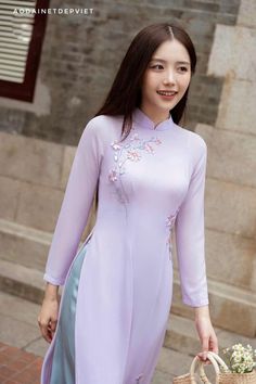 "🌿 This set includes traditional Ao Dai, pants. Style: Traditional Material: Very well made with high-quality silk Collar: traditional collar Please provide bust-waist-and hip measurements when placing your order to ensure the best fit for you. 🌿 NOTE: * Recommend gentle washing * Please contact us for any inquiries about size. We don't have an exchange policy for the wrong size * It is safe for a washer and dryer in a \"delicate\" setting. * Actual Ao Dai colors may differ up to 10% due to lightning and viewing devices. * These ao dai pants are made based on Vietnamese size; they will run smaller than American size. *3D printed ao dai: you may see some white broken fabric around the seam (collar). *There might be some chalk/ pen writings on the fabric because it is brand new, unwashed a Ao Dai Wedding, Ao Dai Vietnamese, Chalk Pens, Purple Daisy, Pants Style, Pastel Purple, Ao Dai, Washer And Dryer, Very Well