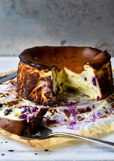 a cake on a plate with a knife and fork