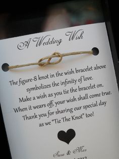 the wedding wish card is attached to a bracelet