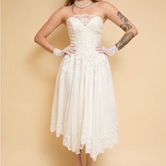 Bought This From An Amazing Vintage Store In La For My Wedding But We Had Some Style Plans In Change And I Will No Longer Need This Dress. Looking To Sell It To A Bride Or Anyone That Appreciates This Beautiful Piece! See Her Description Below. Stunning 1980s Does 1950s White Cotton Eyelet Lace Midi Gown - Perfect For A Beach Wedding Or As Honeymoon Attire! The Helene Gown Features A Hankerchief Hem And A Boned And Structured Bodice With Modesty Lace Panel (Can Be Removed). The Back Features A Zipper Closure And The Dress Is Fully Lined. There Is Also An Inbuilt Mesh Crinoline To Create A Voluminou Skirt. Condition Is Excellent Sans A 1" Black Mark On The Skirt. Listed Size: 4 Modern Size 1980s Wedding Dress, Honeymoon Attire, Hankerchief Hem, 1980s Wedding, Wedding Hankerchief, Midi Gown, Midi Gowns, White Midi, Lace Midi