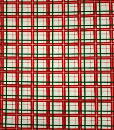 a red and green plaid fabric with white squares