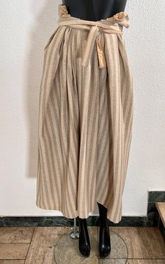 Vintage Kenzo Wrap Skirt 62% Wool 38% Silk XS Measures: Length: 77 cm / 30.31'' Waist: 32 cm / 12.59'' Condition: very good - he has seen a professional cleaner Fall Beige Long Skirt, Daywear Beige Flared Skirt, Beige Flared Skirt For Daywear, Beige Full Skirt With Pockets, Beige Relaxed Fit Full Skirt, Beige Full Skirt Bottoms With Lining, Beige Full Skirt With Lining, Beige Knee-length Bottoms For Spring, Beige Pleated Skirt Bottoms For Daywear