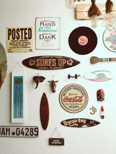 a refrigerator covered in magnets and other items