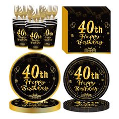 black and gold birthday party supplies for forty years old with candles, plates, napkins and forks