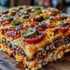 a close up of a slice of pizza on a cutting board with cheese and toppings