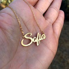 Gold Name Necklace, Bridesmaid Personalized Name Necklace, Gift for Granddaughter, Christmas Gift, Birthday Necklace Wedding Gift Your custom name necklace in 925 sterling silver, gold plated or rose gold plated. Just the way you want it. Use your name or a loved one's name, wife, kids, grandkids, girlfriend for this personalized jewelry, personalized gift. If you have any questions feel free to contact me. You can also have your inspiring word custom made in sterling silver, gold plated, or ros Wedding Necklaces With Names On Pendant, Wedding Name Pendant Necklace, Wedding Pendant Necklace With Names, Nameplate Necklaces Suitable For Gifts, Round Pendant Name Necklace With Custom Name For Birthday, Nameplate Jewelry For Wedding Gift, Birthday Custom Name Necklace With Round Pendant, Nameplate Necklaces For Gifts, Custom Name Round Pendant Necklace For Birthday