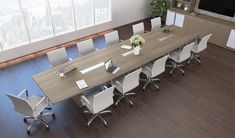 a large conference table with white chairs in an office setting, overlooking the cityscape