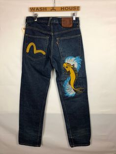 A rare, unique find. These vintage Levis feature a vibrant Koi fish patchwork on the back. Fish Patchwork, Vintage Street Wear, Apparel Design Inspiration, Creative Clothing, Jersey City, Koi Fish, Streetwear Women, Clothing Ideas