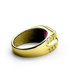 Metal: 14K Yellow GoldGemstone: RubyCarat Total Weight: 3.40Dimensions: 0.8CM x 1.0CMSetting Type: Bezel SettingSecondary Stone:DiamondsCarat Total Weight: 0.02Color: HClarity: VS1Setting Type: Pave Setting See More Categories Ruby Gold Rings 14K Gold Rings Ruby Rings Yellow Gold Rings Gold Rings Uniquely stunning, this gemstone ring showcases an exquisite 3.40 carat ruby and two brilliant diamonds framed in 14k yellow gold.----------------------------------------------------------------------Ru Mens Emerald Rings, Mens Diamond Jewelry, Mens Ring Designs, Yellow Gold Mens Rings, Emerald Rings, Green Emerald Ring, Statement Rings Diamond, Emerald Ring Gold, Gold Topaz