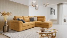 a living room with a couch, table and vases on the floor in front of a large window