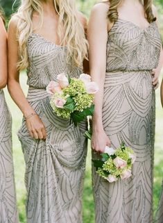 the bridesmaids are holding their bouquets and wearing dresses with sequins