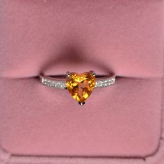 This is a gorgeous handmade creation. Its beauty is its simplicity & Elegance. The 8 mm heart cut faceted natural citrine is crafted in solid sterling silver and with rhodium plated. All item is sent in a beautiful gift box You can realize more lovely stuff clicking the link https://www.etsy.com/shop/knightjewelry?refshopsection_shophome_leftnav Please leave the correct address and you phone number for delivering successfully. Amber Topaz Sterling Silver Promise Ring, Orange Sterling Silver Jewelry For Anniversary, Amber Topaz Ring In Sterling Silver For Promise, Silver Heart Cut Topaz Ring Gift, Silver Heart Cut Topaz Ring, Heart Cut Topaz Gemstone Ring For Promise, Heart Cut Silver Topaz Ring For Gift, Sterling Silver Heart Cut Topaz Promise Ring, Sterling Silver Heart Cut Topaz Ring For Wedding