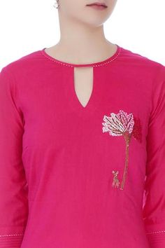 Pink long kurta enhanced with embroidered floral motif.
Components: 1
Neckline: Round 
Sleeve Length: Three quarter
Keyhole neck
Cuff sleeves
 - Aza Fashions Diwali Traditional Straight Kurta With Embroidery, Cotton Kurta With Embroidery For Diwali, Traditional Festive Kurta With Embroidery, Festive Anarkali Top With Embroidered Neckline, Festive Floral Embroidered Straight Kurta Top, Fitted Straight Kurta With Embroidered Neckline, Traditional Long Sleeve Wear With Embroidery, Festive Fitted Traditional Wear With Embroidery, Traditional Straight Kurta Top With Embroidery