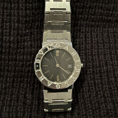 Gently Used Vintage Piece. The Face Is The Medium Size Of Standard Bulgari Watches. It’s Been Loved, Overhauled And Polished Once In The Past, So It’s In The Mint Condition. Very Classy And High End Watch Which Completes Your Look Adding The Class. I No Longer Have A Box But The Watch Comes With A Bracelet Extension Parts And The Certificate. Serious Offer Only Please. Bulgari Watch, High End Watches, The Class, Steel Watch, Stainless Steel Watch, A Box, Accessories Watches, Mint Condition, Medium Size