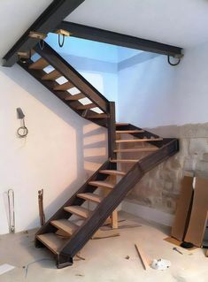 a staircase being built in the corner of a room