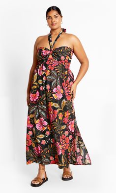 The Peta Print Maxi Dress, with its halter neckline and front keyhole detail, exudes charm and grace. Its shirred and elasticated back ensures a comfortable fit, while the lining, side slits, and pull-over style complete this stunning maxi-length dress. Key Features Include: - Halter neckline - Front keyhole detail - Shirred and elasticated back - Lined - Side slits - Pull over style - Maxi length Style with embellished sandals and a crossbody bag. | Plus Size Maxi Peta Prt 24 in Rio, Size 16/S Black Halter Neck Maxi Dress For Beachwear, Beach Maxi Dress With Elastic Halter Neckline, Black Ruched Halter Neck Maxi Dress, Vacation Halter Dress With Smocked Back, Black Halter Beach Dress With Tie Back, Black Ruched Halter Neck Dress, Black Tie-back Halter Dress For The Beach, Black Halter Dress With Tie Back For Beach, Black Tie Back Halter Dress For The Beach