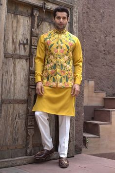 Mustard yellow sleeveless bundi with all over Gul thread embroidery. Paired with a kurta and a pyjama. - Aza Fashions Yellow Nehru Jacket With Zari Work For Diwali, Yellow Nehru Jacket For Spring Festivals, Yellow Nehru Jacket For Festive Spring Occasions, Festive Yellow Nehru Jacket For Spring, Traditional Yellow Nehru Jacket, Fitted Yellow Nehru Jacket For Festivals, Festive Designer Yellow Nehru Jacket, Designer Yellow Nehru Jacket With Zari Work, Fitted Yellow Nehru Jacket For Festive Occasions