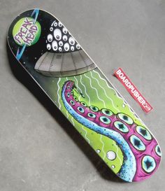 a skateboard with an octopus painted on it's side and the bottom part