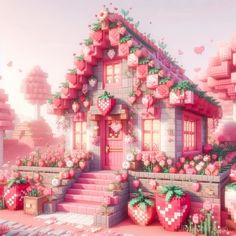 a pink house surrounded by flowers and plants