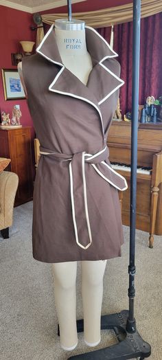 "Classic vintage 1960's blown polyester wrap dress with a cute tie.  Good vintage condition.  It has a little of the lining that needs to be sewn back down (has come unstitched).  This is a fun find. It is 33\" long, size 10us (37\",28\",37\").  Like all vintage things, they are not perfect.  Look at pictures." Brown Wrap Dress, Black Herringbone, Vintage Things, Green Wool, Dress Mini, Pink Mini Dresses, Not Perfect, Tartan Plaid, Wool Fabric