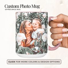 a woman holding up a coffee mug with a photo on the front and side of it