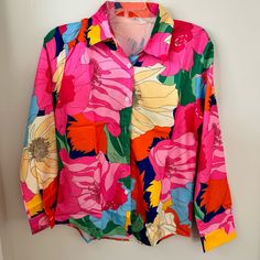 New In Package. Bright Floral Print Blouse With Tropical Vibe. Collared, Button Down. Machine Washable Polyester. Size M. Trendy Button-up Top With Vibrant Print, Trendy Button-up Tops With Vibrant Print, Colorful Long Sleeve Vibrant Blouse, Multicolor Button Closure Blouse For Day Out, Trendy Button-up Blouse With Vibrant Print, Multicolor Blouse With Button Closure For Day Out, Vibrant Button-up Tops For Spring, Spring Shirt With Vibrant Print, Colorful Spring Shirt With Collar