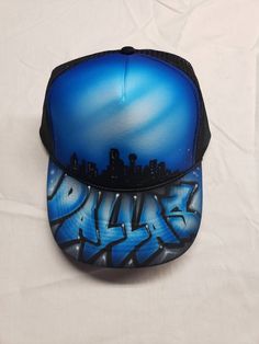 Custom airbrush snapback hat add your city name Customizable Trucker Baseball Cap For Streetwear, Customizable Adjustable Baseball Cap For Streetwear, Hip Hop Blue Snapback Hat For Streetwear, Customizable Snapback Trucker Hat For Streetwear, Customizable Flat Bill Baseball Cap For Streetwear, Airbrush Hat, Custom Airbrushing, Snapback Hat, Trucker Cap