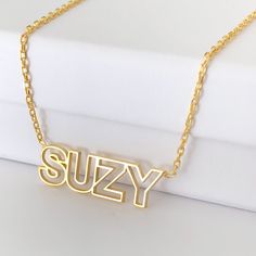 Production Day: 5-7 Days Package: 1 Pack Custom Name Necklace Material: Made of high-quality stainless steel or 925 Silver,100% safe to sensitive skin Color: Gold/Silver/Rose Gold Chain Length: 40+5cm(default)/45+5cm/50+5cm Sweet Gift: Come with a delicate jewelry box,Box packing Dainty Suitable for all occasions: Can be used for various purposes, as a Birth commemoration, Graduation, anniversary of marriage,men's promise,wedding necklace, engagement necklace, anniversary and Valentine's Day gif Gold Nameplate Necklace, Cute Choker Necklaces, Nameplate Necklace Gold, Jewelry Box Design, Engagement Necklaces, Nameplate Necklace, Custom Name Necklace, Cute Necklace, Delicate Jewelry