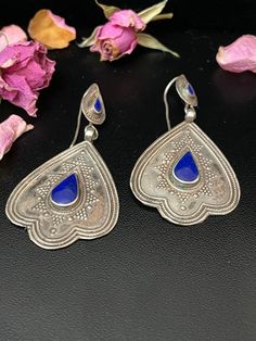 "Afghanistan, Afghan sterling silver Lapis lazuli earrings, Touch of Kuchi tribal jewelry, Vintage earrings tribal jewelry. Length: 2 1/4\" It's All About You, Open studio most days from 10:00 to 5:00, DM, make an appointment to have an adventure in shopping. Yes ~ along with basic simplicity ~ It's all about you You deserve to know about my fabulous Treasure chest. Tribal Jewelry, Statement Piece Handmade Jewelry, Art to Wear, with Much Much More. Looking for more Treasures, Or would like to pu Silver Lapis Lazuli Pierced Earrings, Traditional Blue Filigree Earrings, Traditional Blue Pendant Earrings, Blue Artisan Earrings With Oxidized Finish, Artisan Blue Earrings With Oxidized Finish, Afghan Jewelry, Lapis Lazuli Earrings, Pacific Grove, Ethnic Jewelry