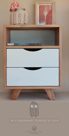 an image of a dresser with drawers on the top and bottom shelf in front of it