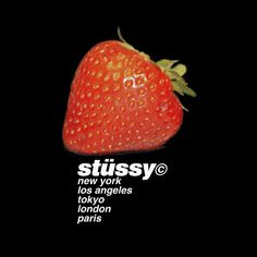 a close up of a strawberry on a black background with the words stuissy